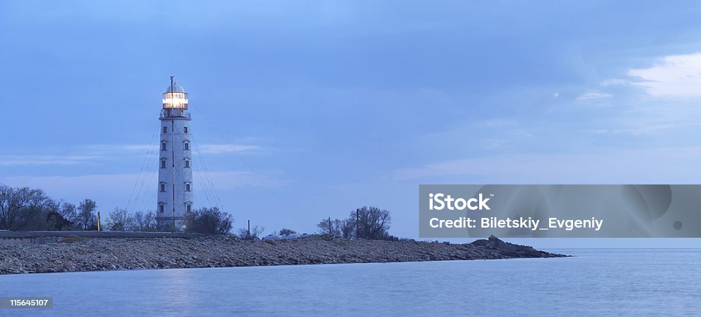 Lighthouse Lighthouse on the seashore. Panoramic Composition Architecture Stock Photo