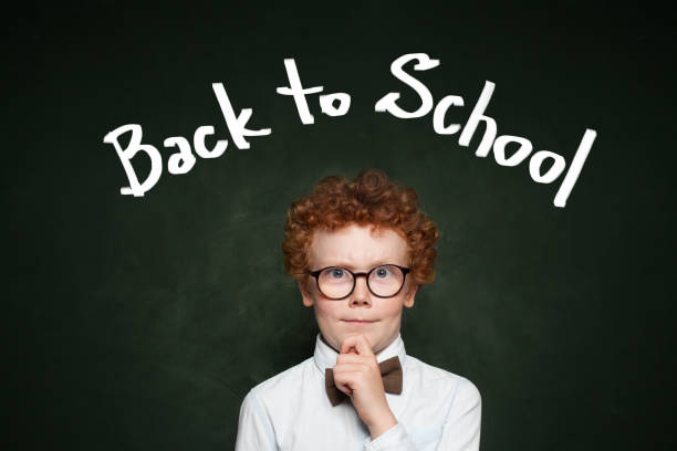 istock Funny child in glasses. Back to school concept 1156456175