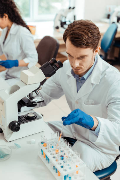 istock Top view of a serious bearded man working 1156456290