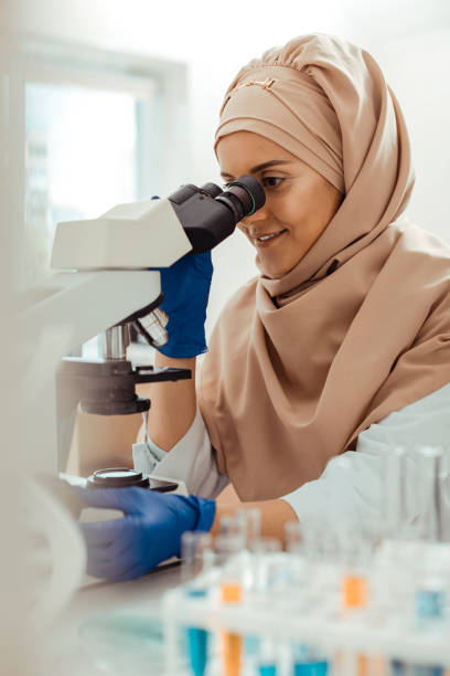 istock Happy cheerful woman doing a successful research 1156456837