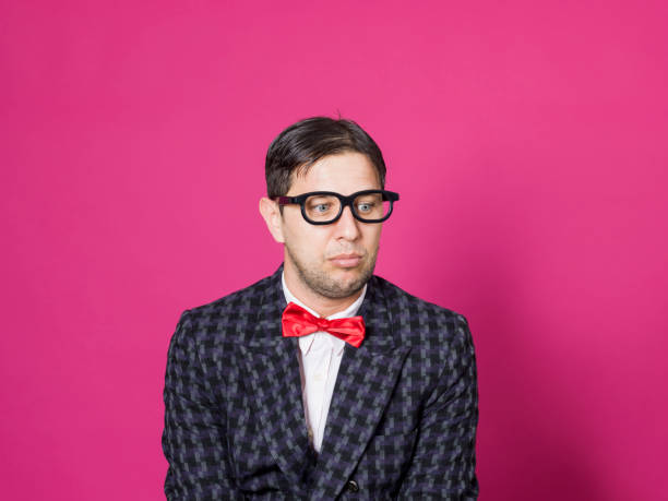 istock Nerd male portrait on pink 1156457180