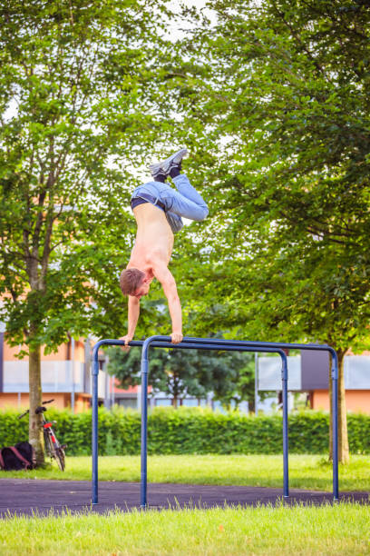 istock Workout in summer: Young fit Caucasian man is doing a workout exercise 1156458358