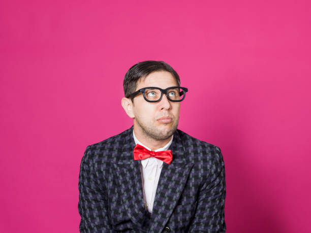 istock Nerd male portrait on pink 1156459816