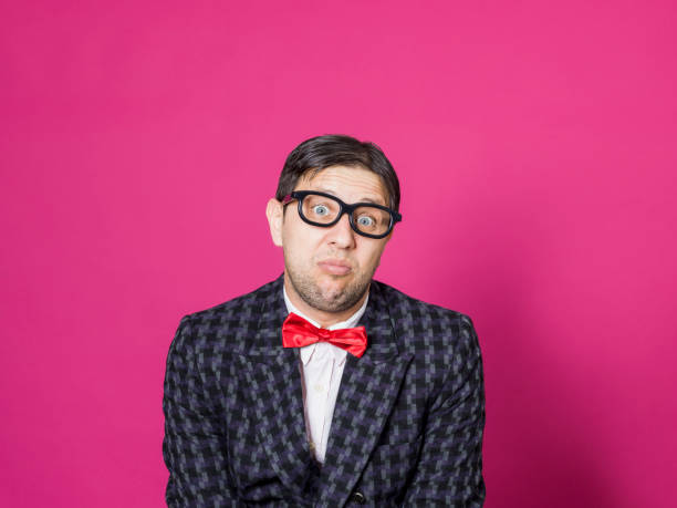 istock Nerd male portrait on pink 1156460458
