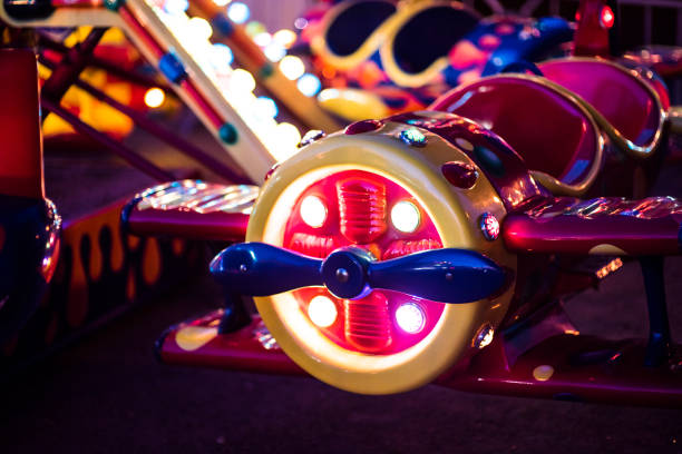 Close-up of old amusement park lights on black background. Retro taste. stock photo