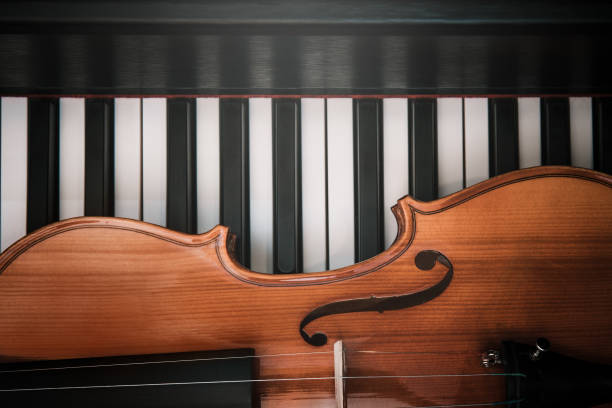 istock Violin and piano. Classical music. 1156462777