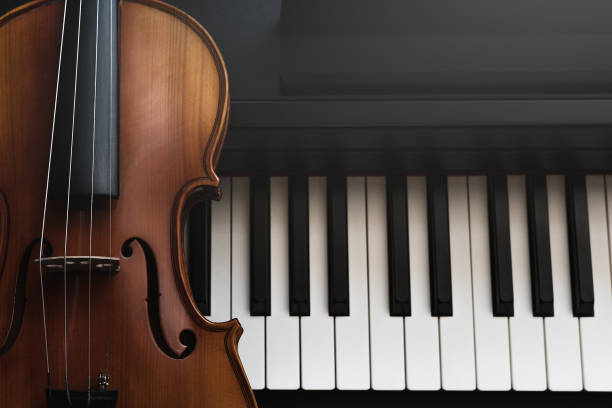 istock Violin and piano. Classical music. 1156462786
