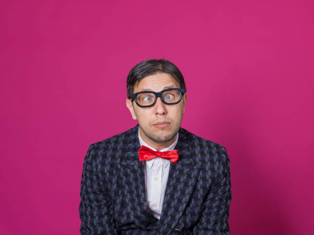 istock Nerd male portrait on pink 1156463099