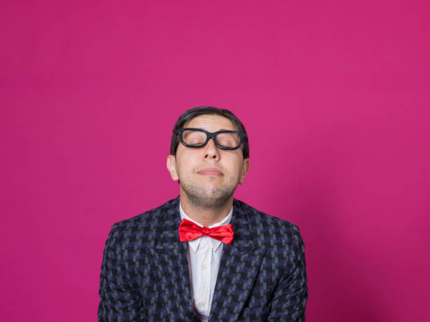 istock Nerd male portrait on pink 1156464196