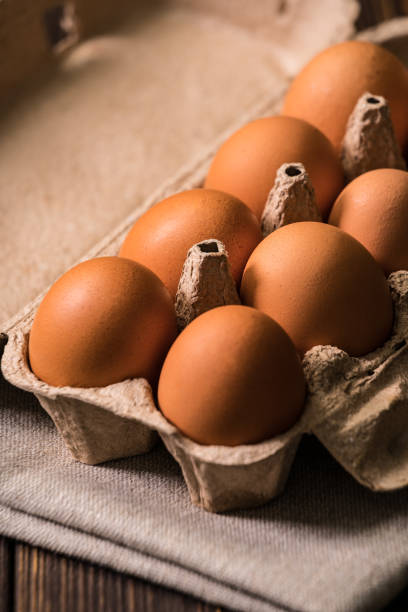 istock chicken eggs on the wooden table background 1156464264