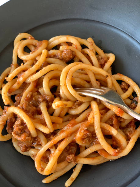 istock pasta with bolognese sauce and fork 1156468898