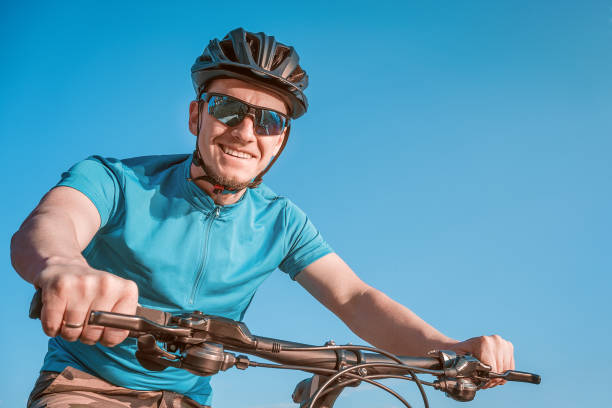 Cyclist. Young man on the mountain bike.