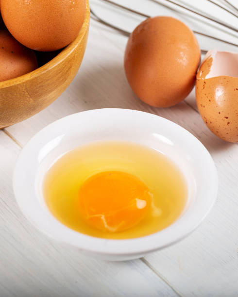 istock Fresh egg yolks in a porcelain bowl 1156469023