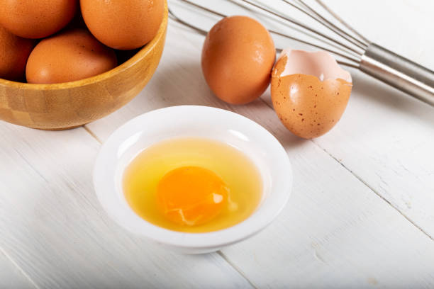 istock Fresh egg yolks in a porcelain bowl 1156469060