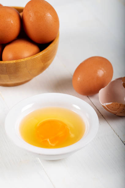 istock Fresh egg yolks in a porcelain bowl 1156469096