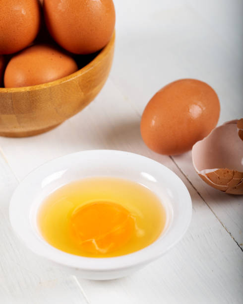 istock Fresh egg yolks in a porcelain bowl 1156469138