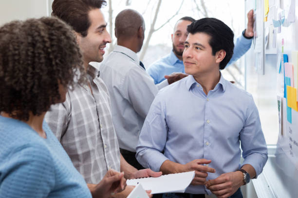 istock Hispanic man receives feedback on plan 1156472958