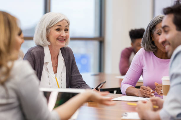 istock Diverse colleagues work during meeting at library 1156473616