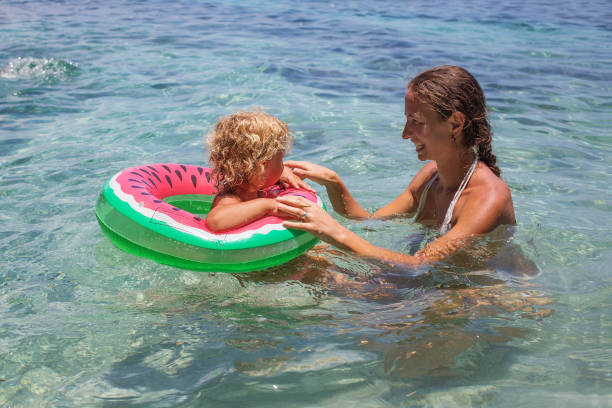 istock A family is having fun at the seashore 1156477908