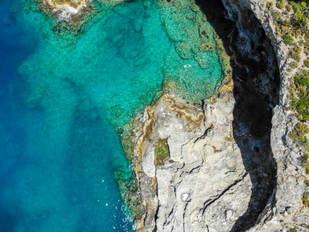 istock Woman floating in desert bay. 1156478991