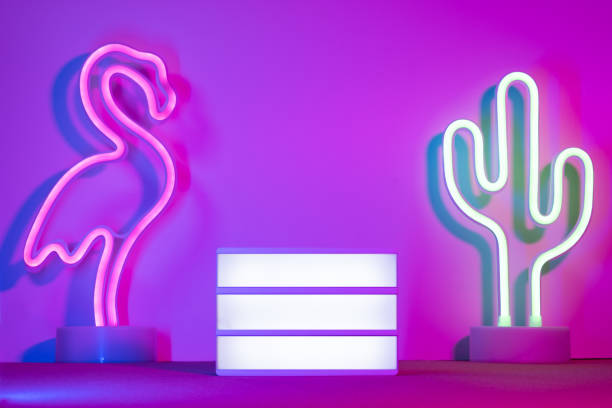 Summer with lightbox and flamingo,cactus neon pink and blue and green light on table with copy space.Trendy vacation holiday background. Summer with lightbox and flamingo,cactus neon pink and blue and green light on table with copy space.Trendy vacation holiday background neon sign ice cream stock pictures, royalty-free photos & images