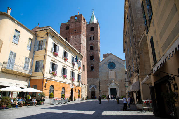 st michael cathedral and square in albenga, italy. - italy albenga liguria tower imagens e fotografias de stock