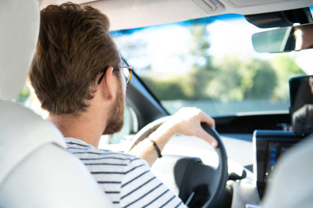 istock Young Man Driving His New Hydrogen Car 1156479596