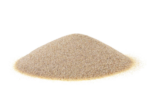 istock Pile of sand isolated on a white background 1156481026