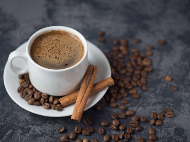istock White Cup of espresso coffee with cinnamon on the copyspace concrete table 1156482060