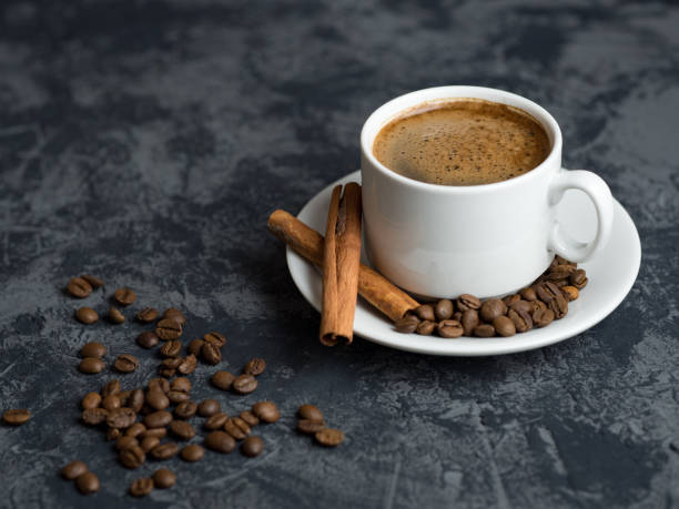istock White Cup of espresso coffee with cinnamon on the copyspace concrete table 1156482061