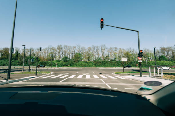 Driver POV personal perspective at the red light new highway