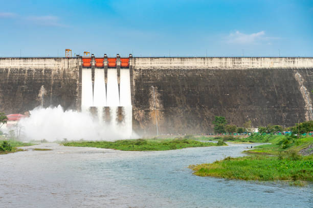 Amazing and beautiful water release at spillway or overflows at big dam with blue sky and cloud (Khun Dan Prakan Chon dam in Nakhon Nayok province Thailand)