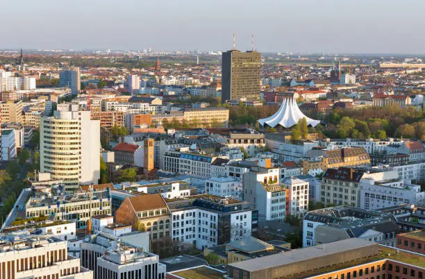 Aerial cityscape with concert hall and Berlin Story Bunker at sunset close to Potsdamer Square, Germany.