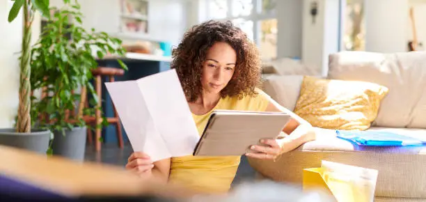 checking her home finances online