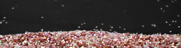 istock Abstract background of sequins. Red and black sparkling backgrond. Festive concept. 1156486483