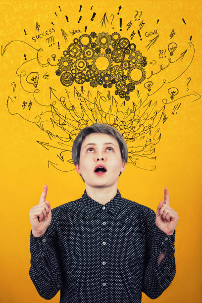 istock cogwheel brain above head. Hard thinking, arrows and curves mess as thoughts. Mental development concept. 1156492964