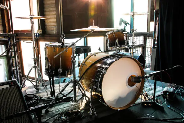 Photo of Drum set in light and shadow