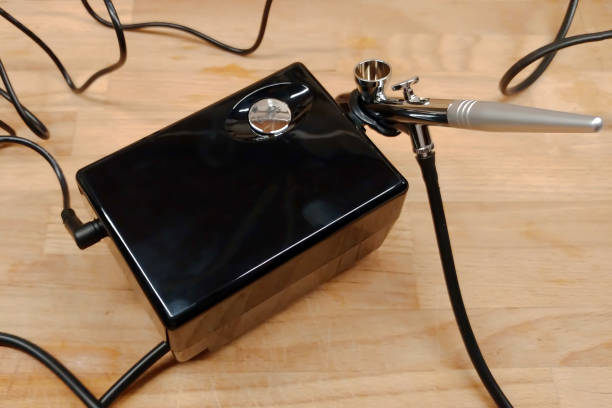 istock Small black airbrush for modeling. Coloring scale models. Paint sprayer. Aerograph 1156494043