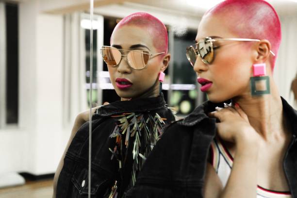 buzz cut woman A dancer who is pink color hair buzz cut woman skinhead haircut stock pictures, royalty-free photos & images