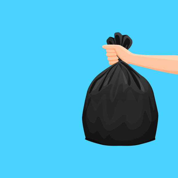 illustrations, cliparts, dessins animés et icônes de sacs déchets, sac en plastique noir d'ordures à la main isolé sur le fond bleu, sac poubelle noir en plastique pour l'élimination des ordures, poubelle sac icône et la main, sacs de déchets pleins, illustration poubelle sac poubelle recycler - écologiste rôle social illustrations