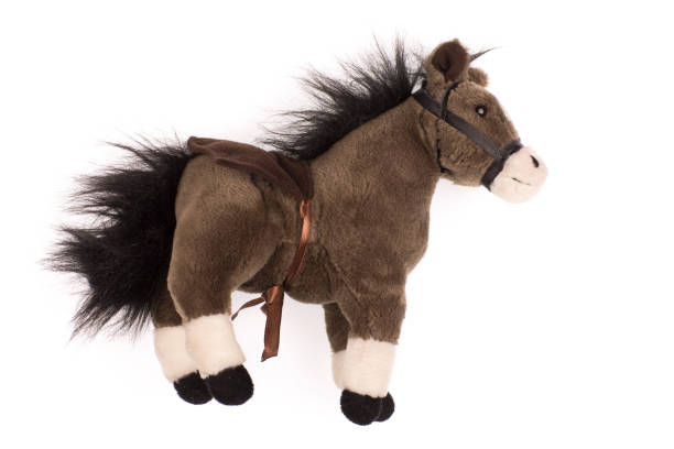 istock soft plush toy pony on a white background 1156496324