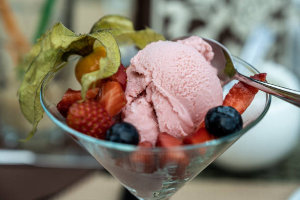 istock strawberry ice cream decorated with strawberries 1156498973