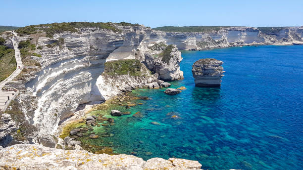 istock Clear blue sea and cliffs of Corsica 1156499544