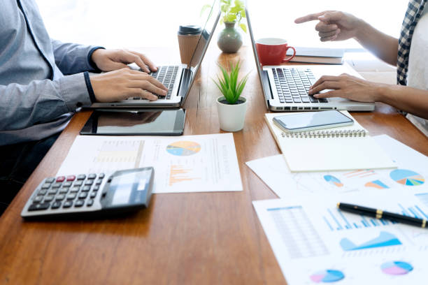 istock businessman work with friend 1156499642