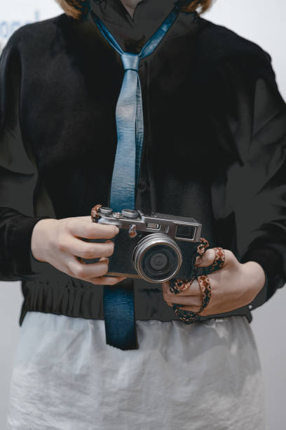 istock Midsection Of Woman Photographing From Camera 1156500639