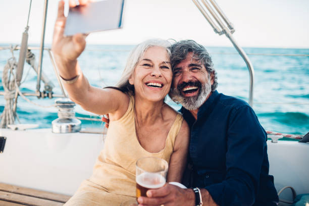 istock Couple taking a selfie on boat 1156500834