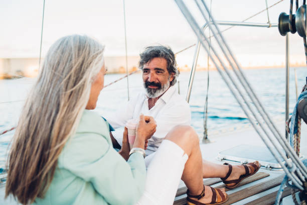 istock Couple drinking coffee to go on ship 1156501705