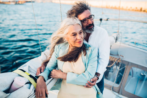 istock Beautiful old people hugging on a boat 1156502096