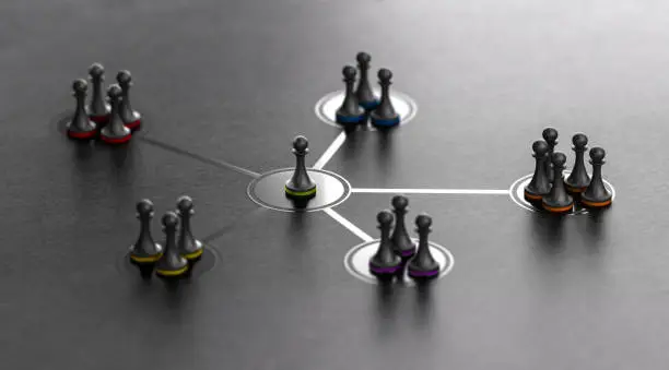 Organized groups managed by a leader. 3D ilustration of pawns with different colors over black background.