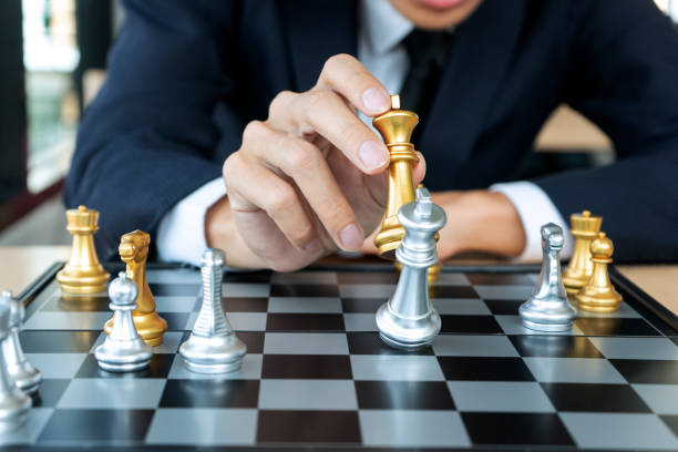 istock Businessman play chess how  to crash 1156507049